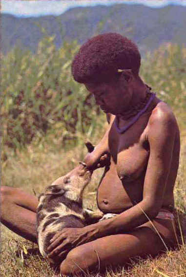 Woman Breastfeeding Animal